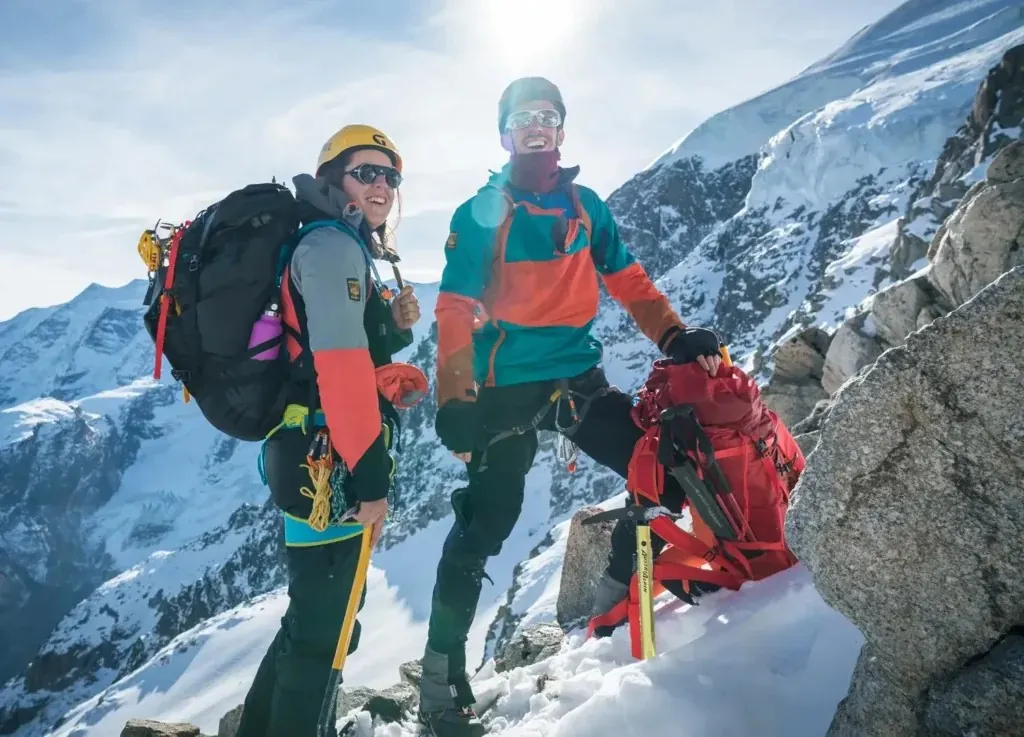 Two mountaineers on a snowy ridge