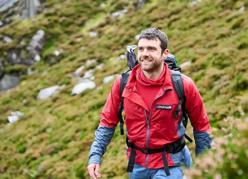 Man hiking in a red Páramo jacket